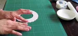 Make fondant frills using a frill cutter for cake decorating