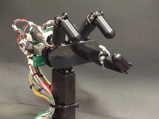 Dexterous Bot Kicks Human-Butt at Pen Spinning