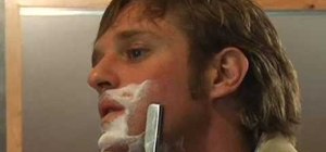 Shave a face with a straight edge blade