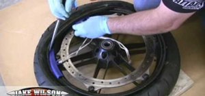 Change a tubeless motorcycle tire