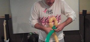 Make a simple balloon sunflower out of 2 balloons
