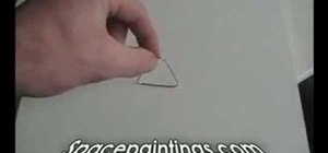 Turn a paper clip into a jumping toy