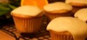 Bake and decorate fresh orange cupcakes with orange icing