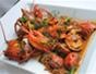 Make a Homard Á L'Américaine - lobster with wine, tomatoes and herbs