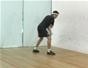 Perform a squash solo drill: backhand drive