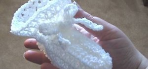 Crochet fuzzy white baby booties