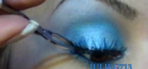 Get a soft blue makeup look using NYX Magic Wand