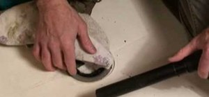 Remove a fiberglass shower pan