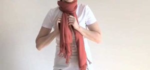 Tie your scarf into a turtleneck knot