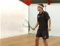 Do a squash forehand recovery deep in back corner