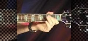 Play the "Rumba Blues" on an electric blues guitar