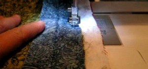 Attach binding to a quilt