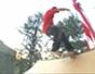 Tail slide on a skateboard with Rob Dyrdek