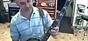 Play a bluegrass banjo lick on a Bb pentatonic scale
