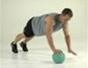 Tone abs with a medicine ball hand walk exercise