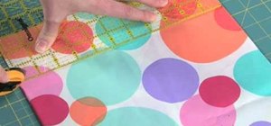 Cut fabric with a rotary cutter