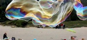 Giant Beach Bubbles Resemble Ghostly Whales