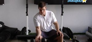 Do a wrist curl weight-lifting exercise with dumbbells