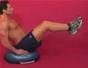 Exercise with double crunches on bosu w/ arms at side