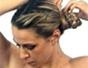 Create a braided bun updo hairstyle