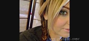 Create a low side fishtail braid with bangs