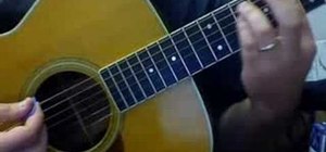 Play "Roll Out the Barrel" by Milburn on the guitar
