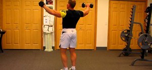 Do a standing dumbbell lateral lift to tone rear deltoids and shoulder