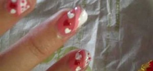 Do a heart design Valentine's Day nail look