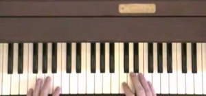 Play "Yesterday" by The Beatles on piano