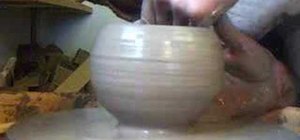 Throw a rounded raku bowl