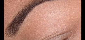 Shape your eyebrows using a creamy eye pencil