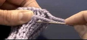 Weave in loose ends of knitting using a yarn needle