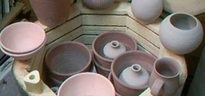 Pack an electric kiln with pottery