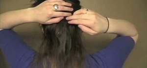 Create a braided hairdo with clip-in hair extensions