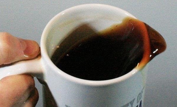 Stop Your Sloshing: How to Carry a Hot Cup of Joe Without Spilling Any Coffee on You
