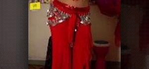 Add a bounce to your hips while belly dancing