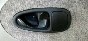 Remove a rear inside door panel from a Saturn S series