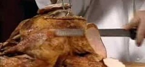 Carve a roasted Thanksgiving turkey
