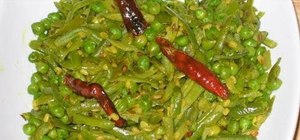 Cook Indian style green beans and peas