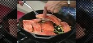 Cook a pan roasted salmon with garlic and lemongrass