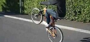 Pop a wheelie on a mountain bike