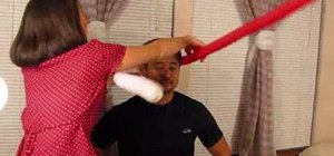 Make a candy cane or twisty balloon hat