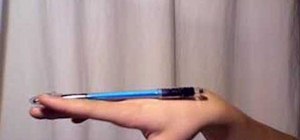 Perform the backaround pen spinning trick