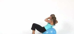 Do side crunches on an exercise ball