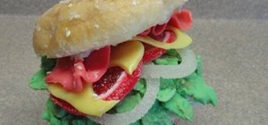 Decorate cupcakes into realistic ham and cheese deli sandwiches