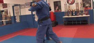 Perform a major outside foot reap in judo