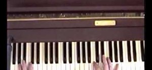 Play "Let It Be" by the Beatles on piano