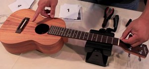 String or restring a ukulele with a tie bridge