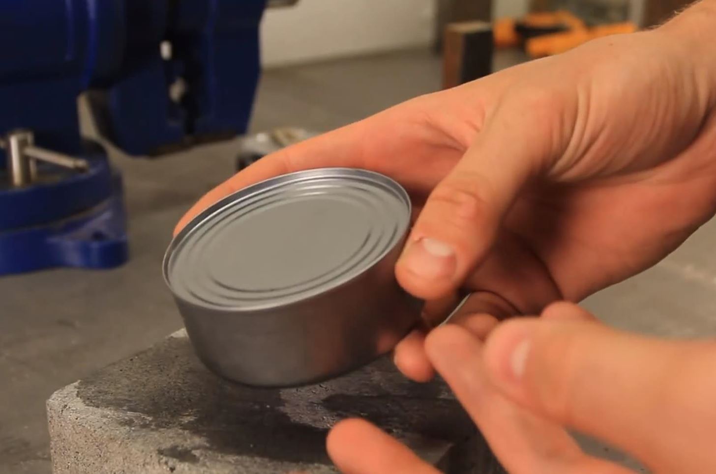 How to Break Open a Can of Food Without a Can Opener