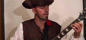 Play the "Pirates of the Caribbean" theme song on electric guitar